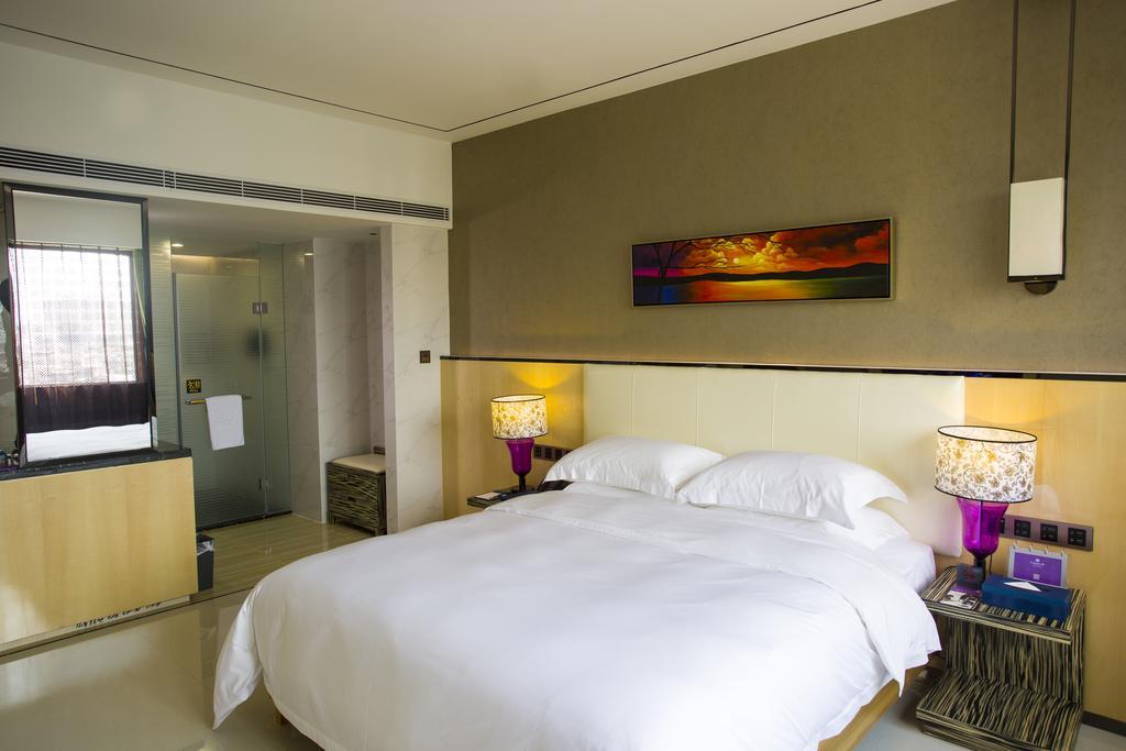 Lori Star Hotel Qionghai Quarto foto