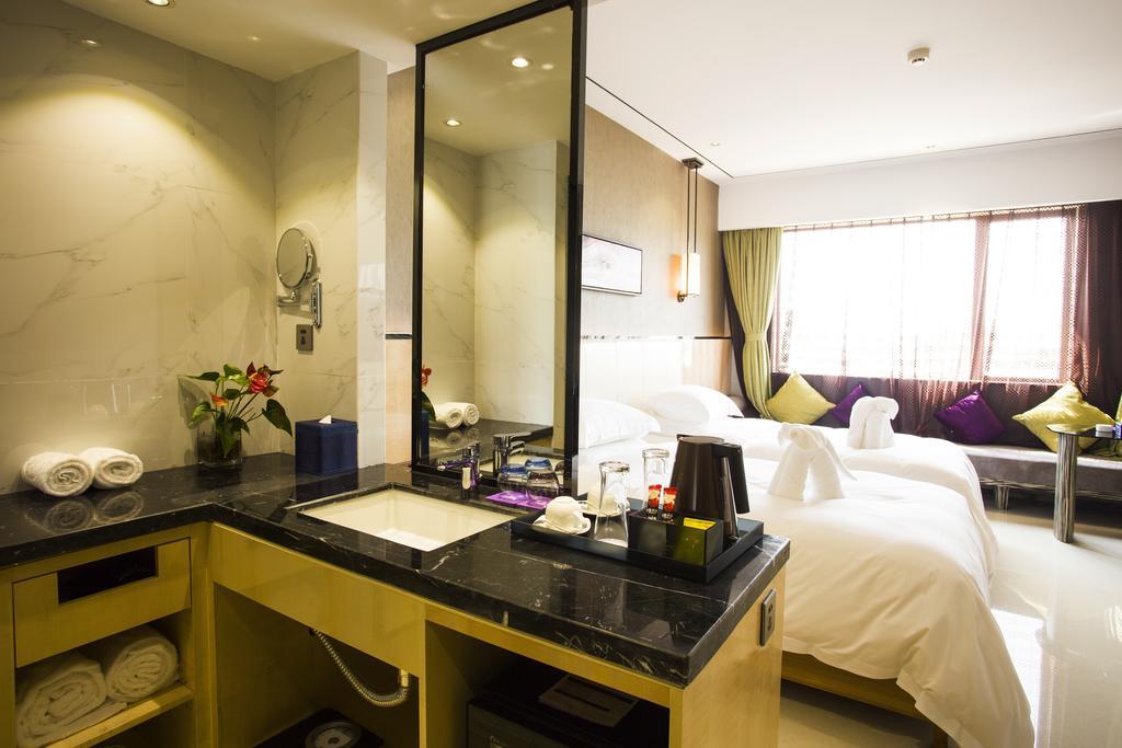 Lori Star Hotel Qionghai Quarto foto